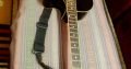 acoustic guitar with bag and belt