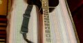 acoustic guitar with bag and belt